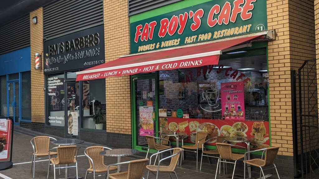 local cafe Fat Boys Cafe at Edmonton Green in North London with outdoor seating offering coffee and lunch at affordable prices